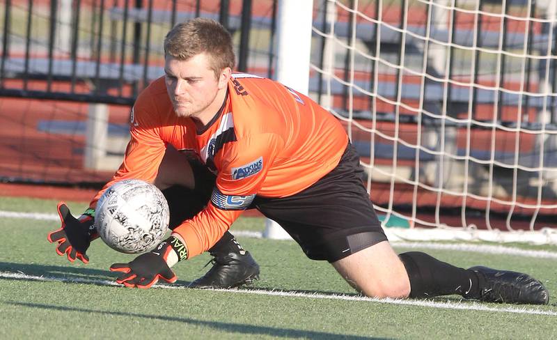 Rockford FC keeper Carson Davenport stops a DeKalb County United shot Wednesday, July 13, 2022, as the teams battle for the 815 Cup at the Northern Illinois University Soccer and Track and Field complex in DeKalb.