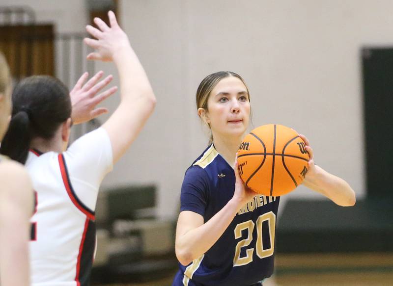 Marquette's Kaitlyn Davis reaches 1,000 career points with this shot against Amboy/Ohio during the Class 1A Regional championship on Thursday, Feb. 20, 2025 at St. Bede Academy.