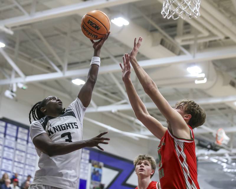 Kaneland's Marshawn Cocroft (3) puts up a shot during their Plano Christmas Classic semi-final basketball game between Kaneland at LaSalle Peru Monday, Dec 29, 2025 in Plano.