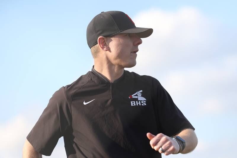 Bolingbrook head coach Scott Thyer heads back to the dugout against Plainfield East on Monday, March 27, 2023.