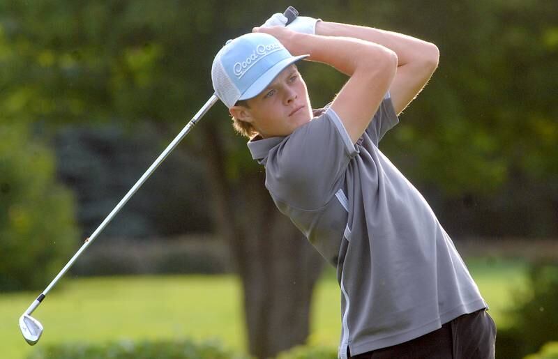 Oswego East's Connor Banks tees off with an iron on the 4th hole during the Southwest Prairie Conference boys golf meet at Blackberry Oaks Golf Course in Bristol on Wednesday, Sept. 20, 2023.