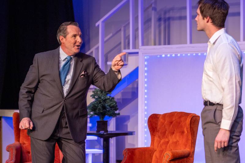 “Frank Abagnale Sr.” (Played by Dave Roden) points at Son, “Frank Abagnale Jr.” (Played by Payton Drake) on Monday, March 24, 2025 at River Valley Players Theatre in Henry.
