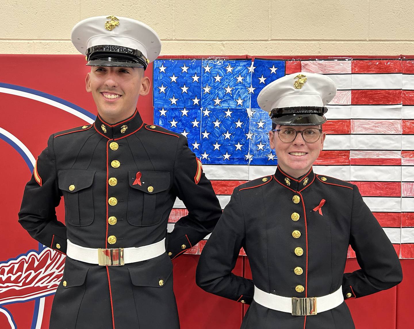 Jimmy Keaty and Hailey-Jane Becker pose for a photo after attending the Oregon School District's Veterans Day Assembly on Tuesday, Nov. 11, 2025. Keaty and Becker are 2025 graduates of Oregon High School and just completed boot camp in San Diego for the US Marines and are awaiting assignment.