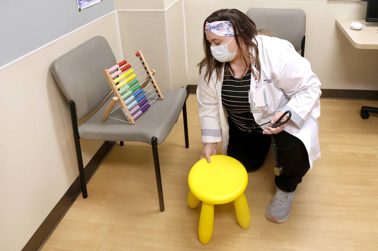 Pediatrician Dr. Blair Wright sets up an examination room for a patient visit Friday, Nov. 4, 2022, at Northwestern Medicine Valley West Hospital in Sandwich.