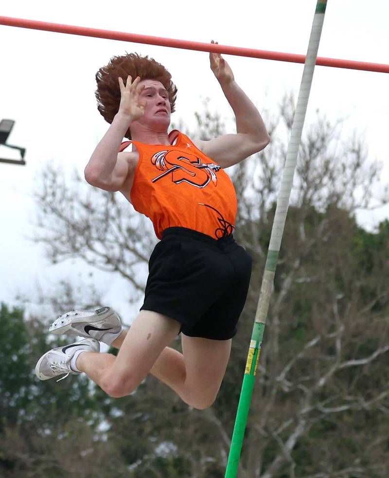 Sandwich’s Jacob Ross clears the bar in the pole vault Thursday, May 16, 2024, during the Class 2A boys track sectional at Sycamore High School.