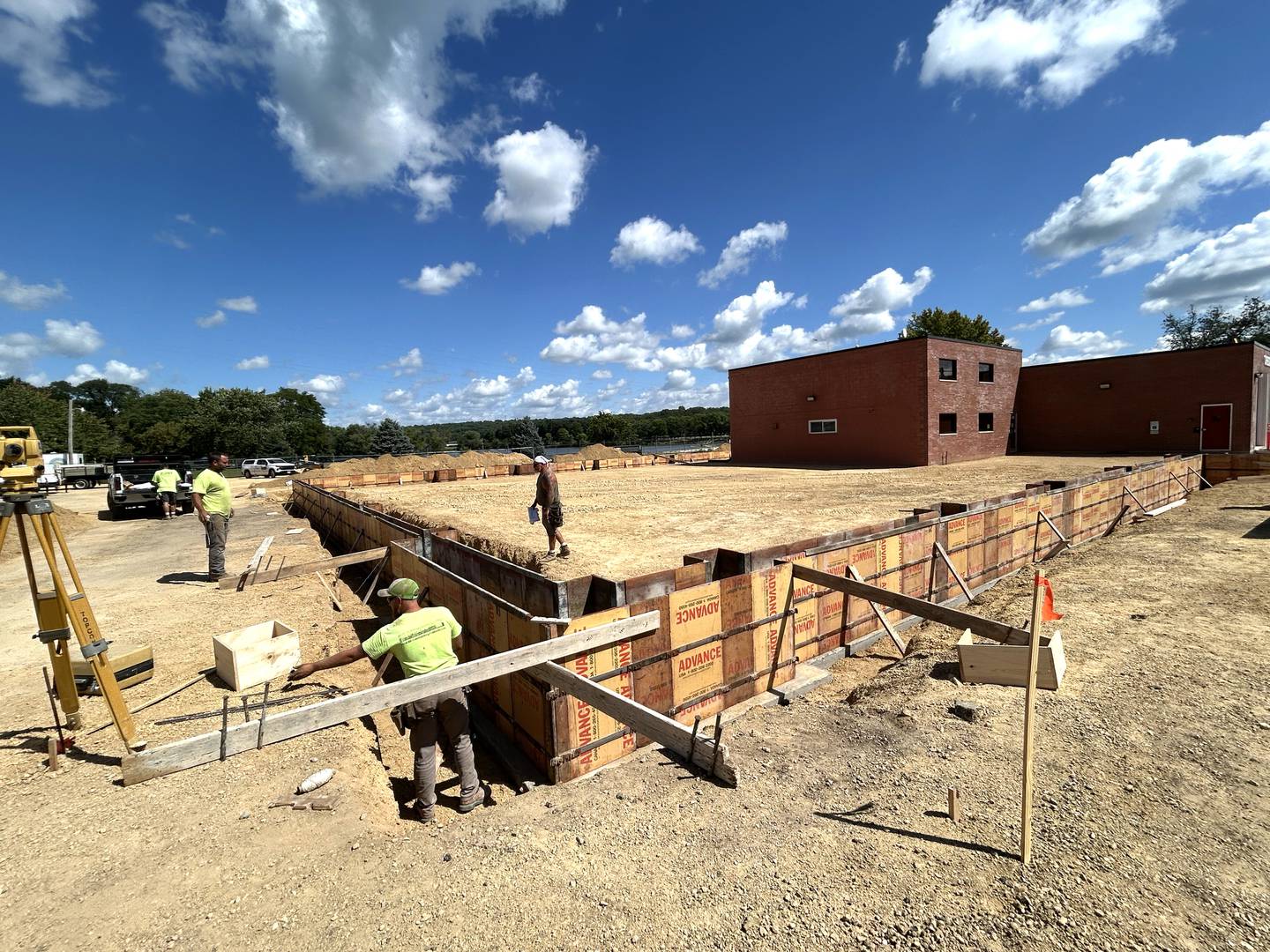 Consctruction works were busy Aug. 27, 2025,  at the Oregon Fire Station expansion on Aug. 27, 2025. The current fire station can be seen in the background.