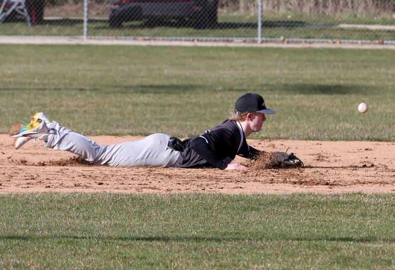 Woodland/Flanagan-Cornell short stop Connor Dodge misses a ground ball on Wednesday, March 27, 2024 at Masinelli Field in Ottawa.