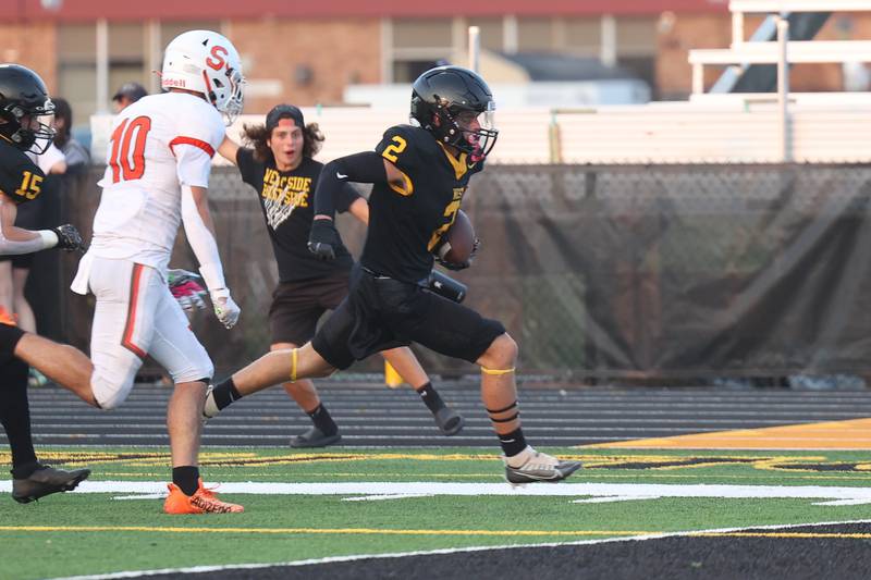 Joliet West’s Cael Karczewski scores on a fumble recovery against Shepard on Friday, Aug. 25, 2023 in Joliet.