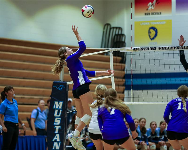 Downers Grove North's Kelley Crowley (9) eyes a kill shot attempt during volleyball match between Downers Grove North at Downers Grove South.  Sept 7, 2023.