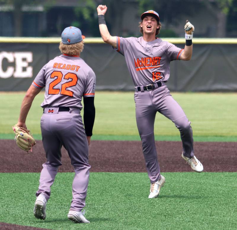 McHenry’s Kyle Maness, right, and Zachary Ready begin to celebrate the final out against Barrington in IHSA Class 4A Sectional Title Game baseball action at McHenry High School in McHenry on Saturday, June 7, 2025.