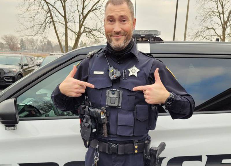 Yorkville police officer Timothy Kolowski shows off his new body-worn camera. The devices are now standard equipment for the Yorkville Police Department. (Photo provided by Yorkille Police Department)