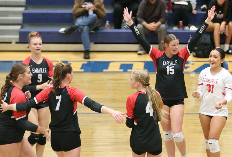 Members of the Earlville volleyball team react after defeating Leland during the Class 1A Regional semifinals on Monday, Oct. 27, 2025 at Somonauk High School.