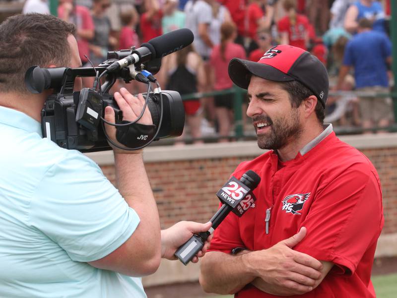 Henry-Senachwine head baseball coach Max Kirbach is interviewed by WEEK TV during the Class 1A Supersectional game on Monday, May 29, 2023 at Illinois Wesleyan University in Bloomington.