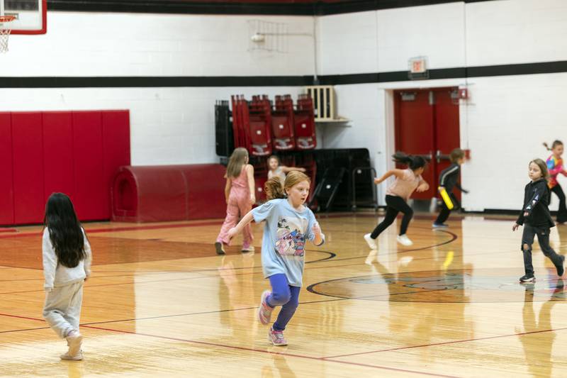 Students in PE class at East Coloma-Nelson burn off energy Thursday, Nov. 13, 2025. The school ranked in the top 10% of all Illinois schools in 2025.