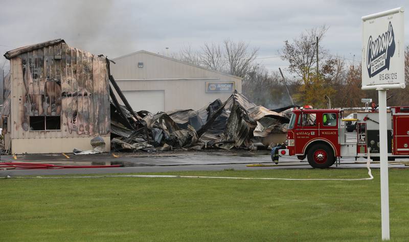 A view of the remains of a fire at Conroy's Automotive and 24 Hour Towing building on Wednesday, Nov. 6, 2024 in Ottawa. Fire departments from Wallace, Grand Ridge, Senera, Seneca, Utica and Peru all responded to the blaze.