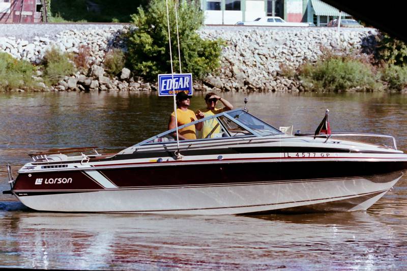 A pair of boaters display a Jim Edgar candidate for Governor sign while on the Illinois River listening to Jim Edgar give a speech on Thursday, Aug. 30, 1990 in Peru.