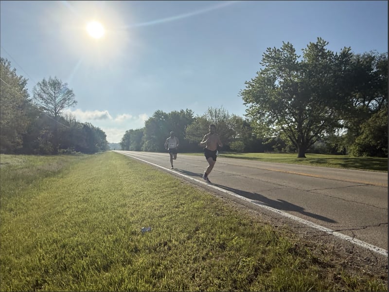 Alberto Salas (right) making his way through Starved Rock State Park during the Starved Rock Country full marathon on Saturday, May 9, 2026. Salas, a Joliet resident, finished third overall with a time of 3:19.33, reaching his goal of a sub-3:20 performance.