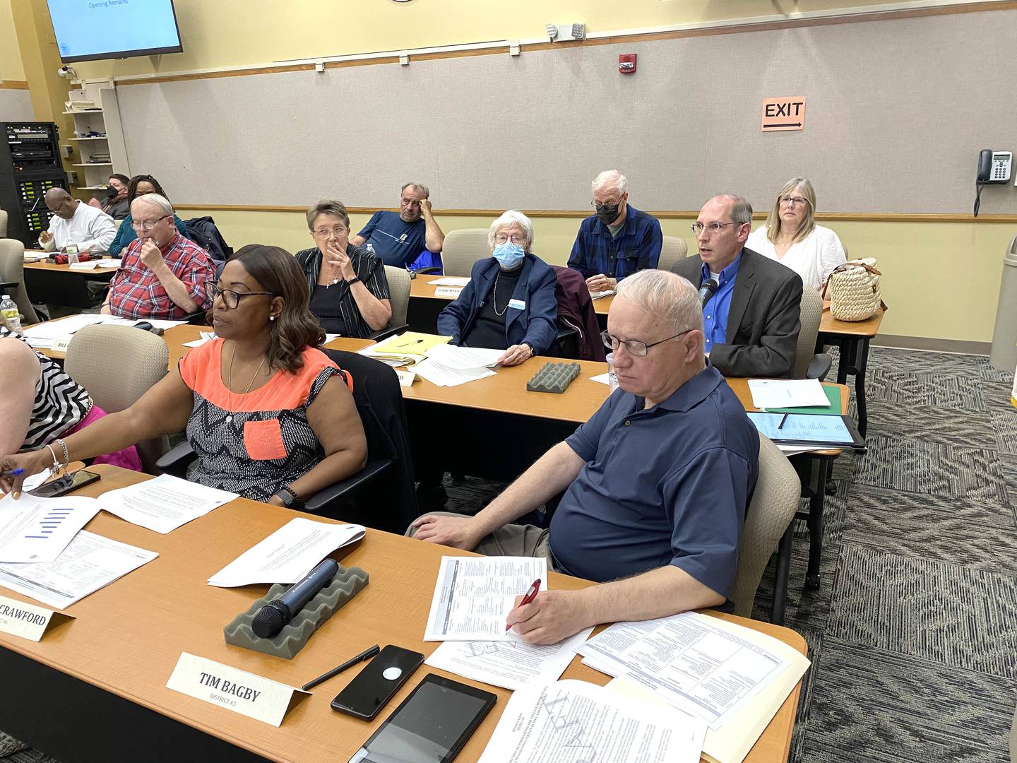 DeKalb County Board members listen as member Scott Campbell (right, middle row) gives a financial report about the DeKalb County Rehabilitation and Nursing Center, which could be sold to an Evanston-based buyer for $8.1 million, during a Committee of the Whole meeting Wednesday, June 8, 2022.