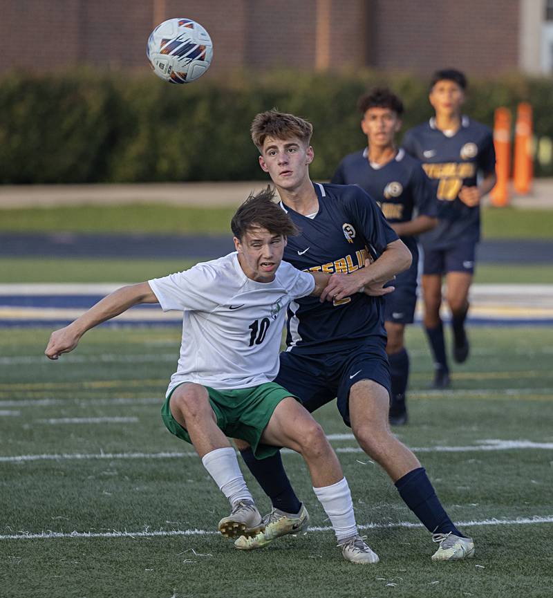 Sterling’s Liam Gardner and Alleman’s Caleb Kale eye the ball Tuesday, Sept. 19, 2023 at Sterling High School.