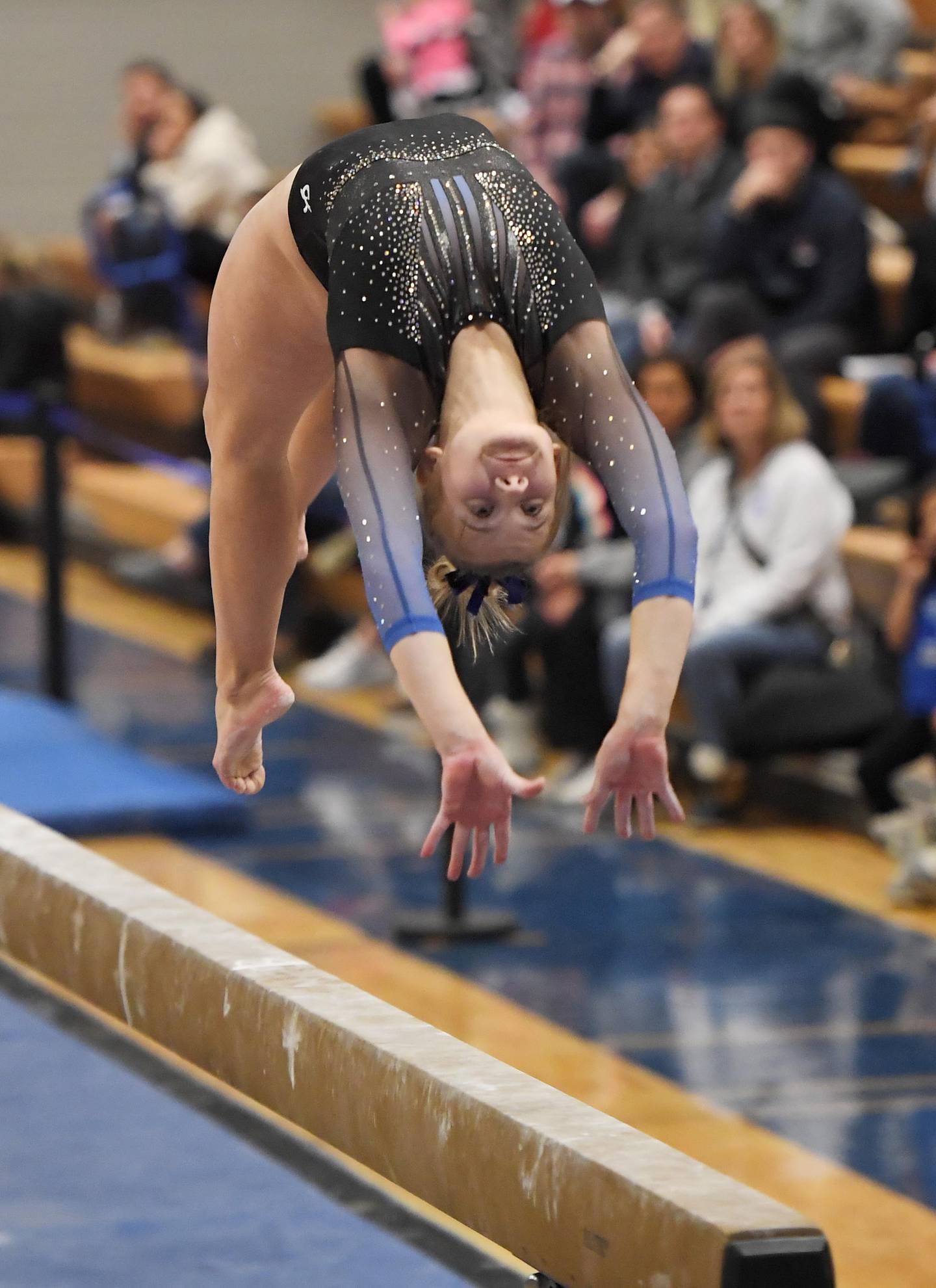 Geneva’s Brooke Lussnig performs on the balance beam at the Geneva girls gymnastics regional meet in Geneva on Wednesday, February 1, 2023.