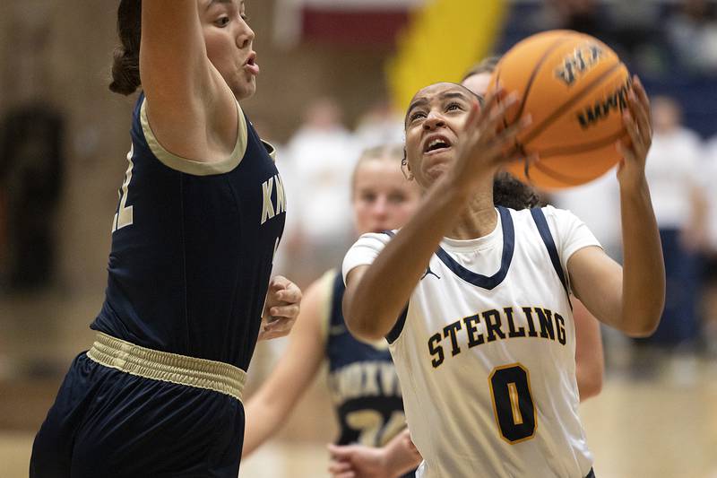 Sterling’s Alivia Gibson works below the basket against Knoxville Tuesday, Nov. 19, 2024, at Sterling High School.