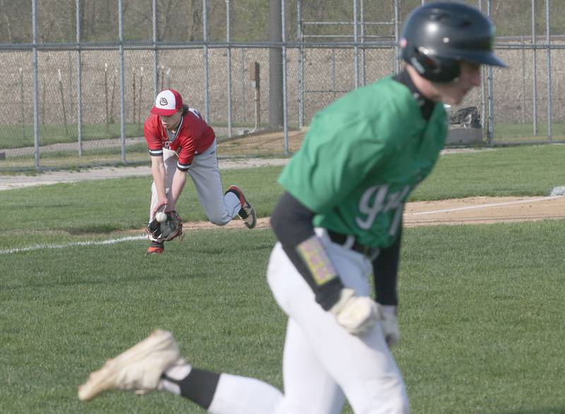 Streator's Clay Christoff makes an error as Seneca's Brody Rademacher reaches first base on Friday, April 19, 2024 at Seneca High School.