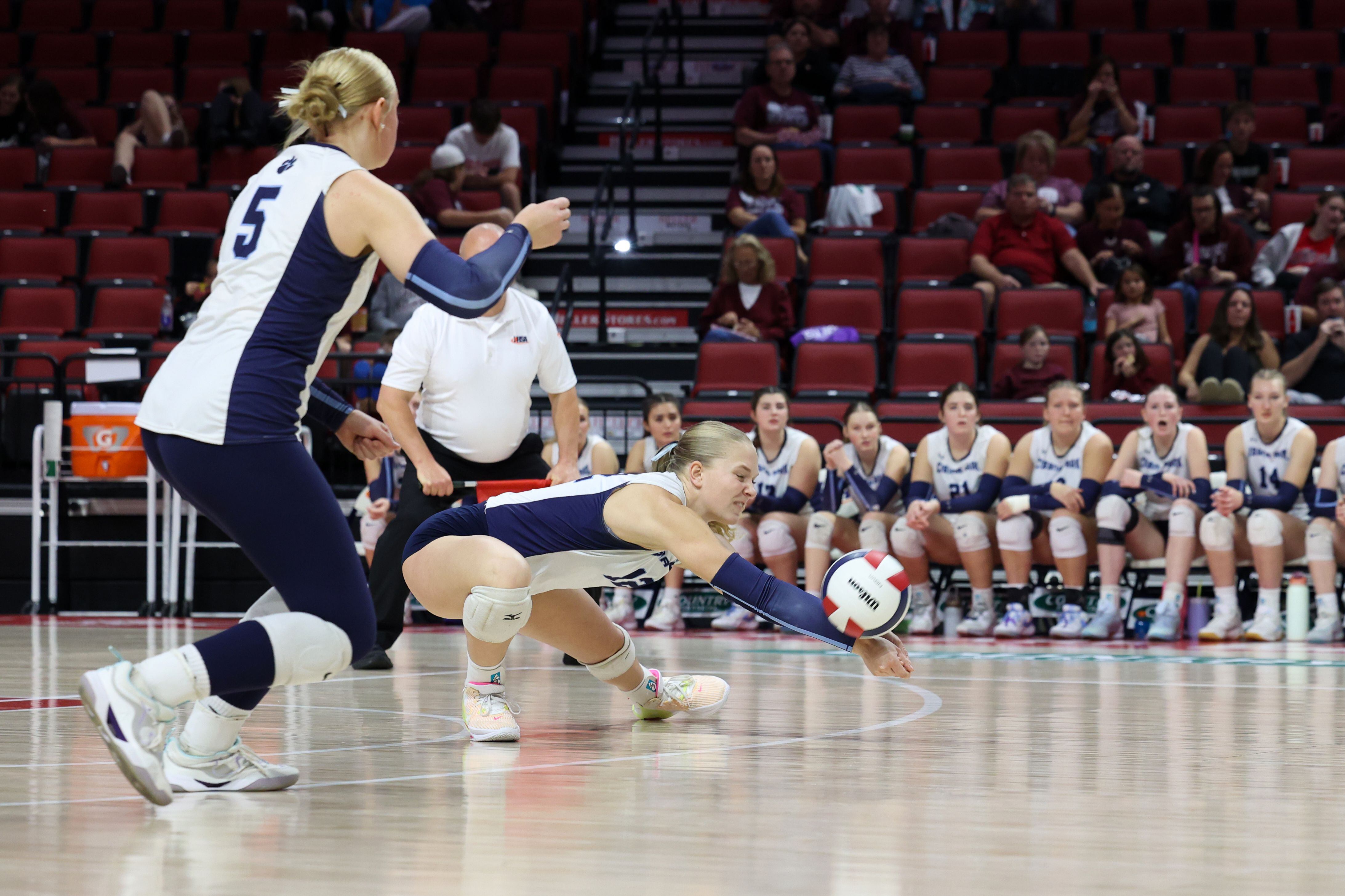 Cissna Park's Josie Neukomm gets under the ball during the Timberwolves' victory in two sets, 25-11, 25-14, over Stockton in the IHSA Class 1A State championship on Saturday, Nov. 15, 2025.