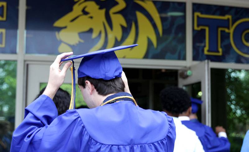 Lyons Township High School graduates head into the school’s South Campus before the school’s 2023 commencement ceremony in Western Springs on Wednesday, May 31, 2023.