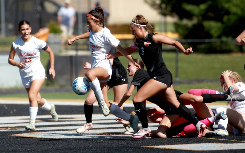 St. Charles East's Mya Leon gets control of the ball during a game against Wheaton Warrenville South on Friday, May 16, 2025 in Wheaton.