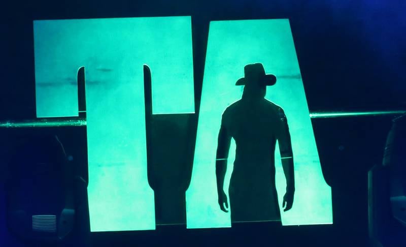 A Trace Adkins logo can be seen on his set while performing on Thursday, Aug. 21, 2025 at the Bureau County Fair in Princeton.