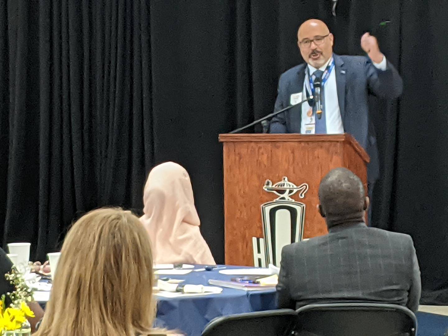 Dist. 308 Superintendent Andalib Khelghati addresses those attending the first Annual SD 308 District Dialogue: CommUNITY in Education event June 11 at Oswego High School.