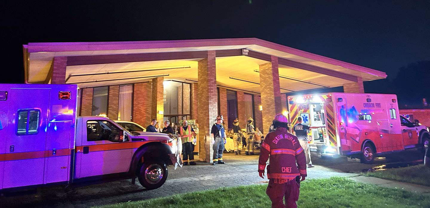 Firefighters and other first responders work with staff of the Polo Rehab & Health Care Center late in the evening on Monday, July 15, 2024 to evacuate the center's 19 residents after smoke filled one wing of the center. Fire officials believe a roof-top HVAC unit may have been damaged by the strong storm that passed through the town earlier in the evening.