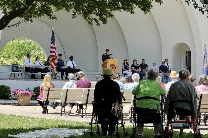 Illinois National Guard Specialist James Hartwig of DeKalb, who is serving with B-Troop 2/106 Calvary in Dixon, serves as the Memorial Day speaker during an observance at Grandon Civic Center in Sterling on May 29, 2023.
