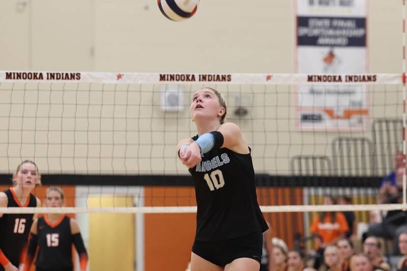 Joliet Catholic’s Olivia Emerson runs down the ball against Minooka on Wednesday, Sept. 4, 2024 in Minooka.