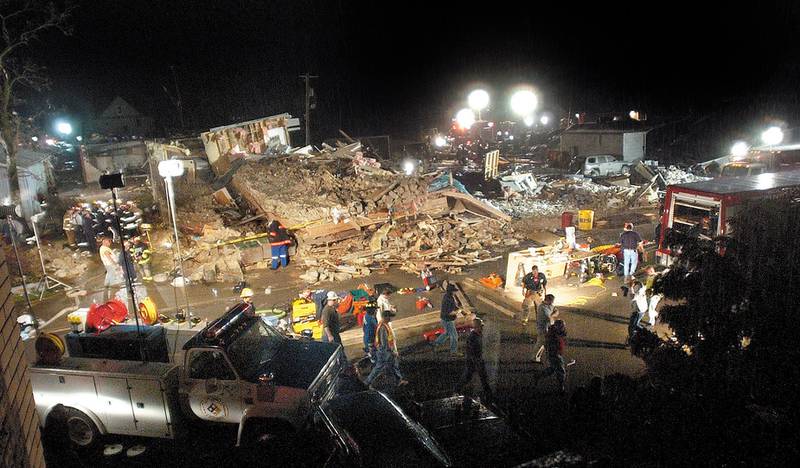 Work carried through the night in attempt to rescue those under the rubble from the tornado at the Milestone on Tuesday, April 20, 2004 in Utica.