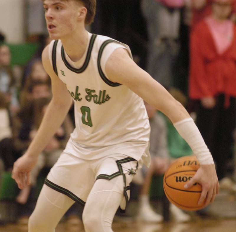 Rock Fall's Max Burns controls the ball. The Rock Falls Rockets hosted the Dixon Dukes in a Conference basketball game. The game was held at Forest Tabor gym in Rock Falls on Friday, February 13, 2026
