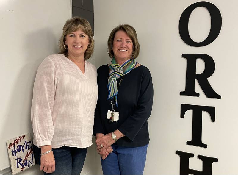 Donna Hill and Christine Berg stand together in North Elementary at the end of their teaching careers. Berg taught at North Elementary for 33 years, but when she was a second grader Hill was her teacher. This summer Berg and Hill enter retirement at the same time. Photo provided by Christine Berg.