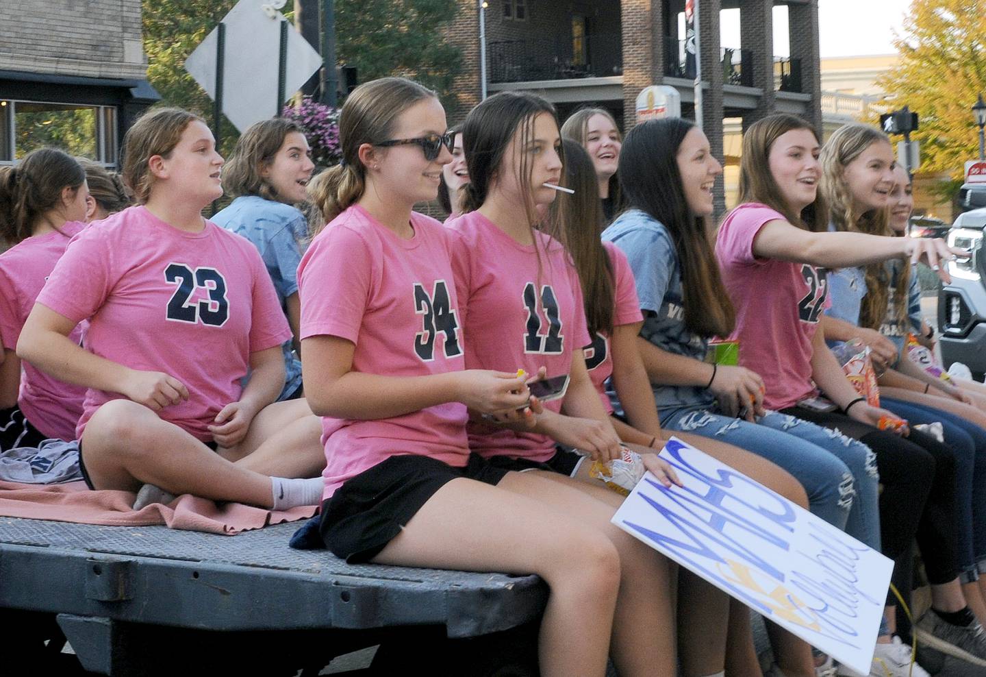 Marquette Academy parades through downtown Ottawa to celebrate