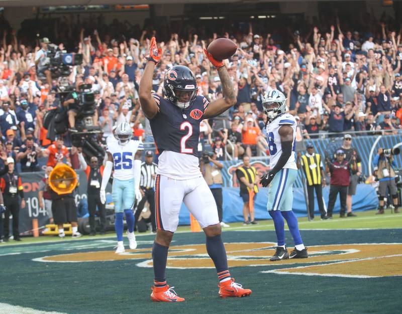 Chicago Bears wide receiver DJ Moore reacts after scoring a touchdown against the Dallas Cowboys on Sunday, Sept. 21, 2025 at Soldier Field.