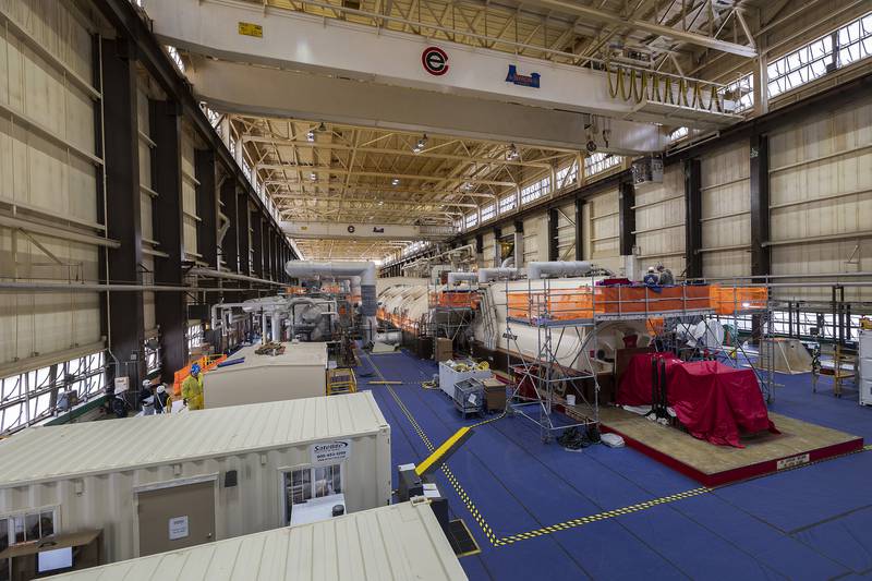 Contractors work in the turbine room of Plant 2 on Wednesday, April 16, 2025, in Byron.