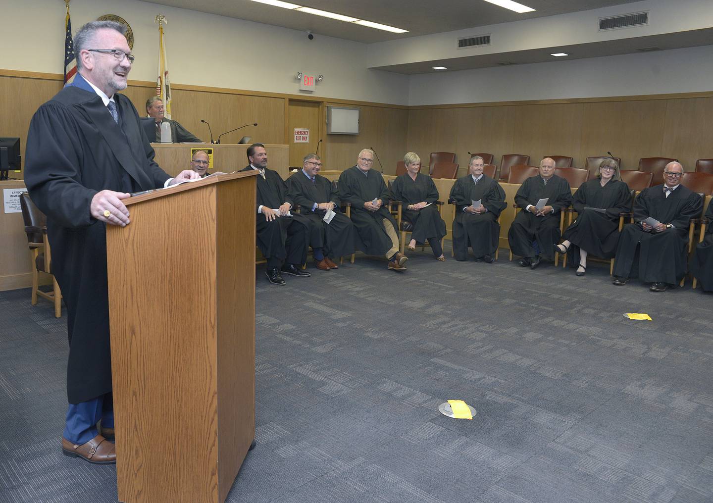 After being sworn in, new Associate Judge Mark Anderson speaks to the crowd assembled Wednesday at the downtown courthouse in Ottawa.