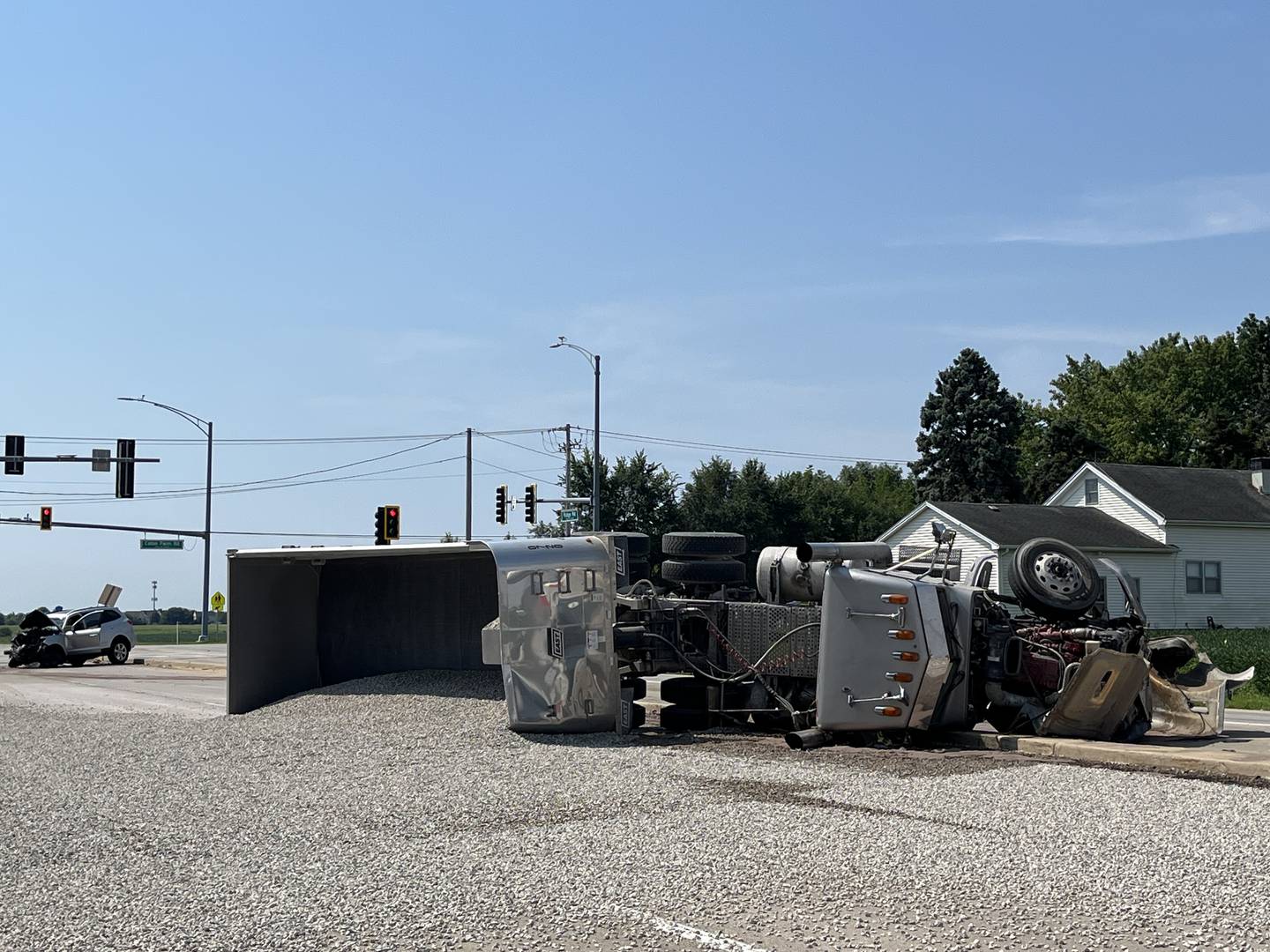 An overturned semitrailer at Caton Farm Road and Ridge Road in Joliet on Saturday, Aug. 16, 2025.