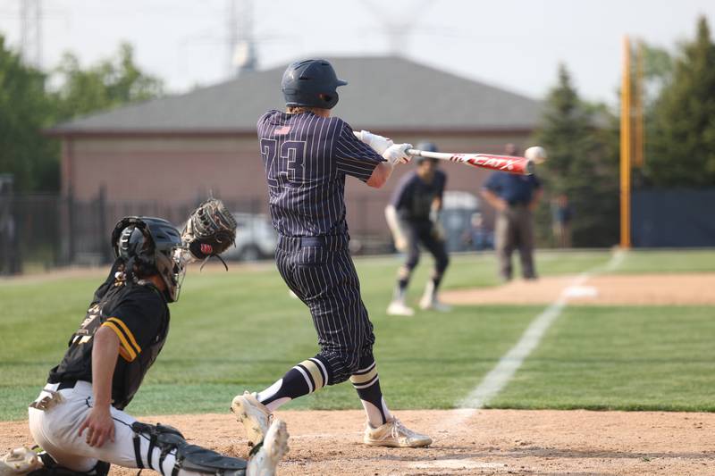 Lemont’s Conor Murray connects for a RBI double against Hinsdale South on Wednesday, May 24, 2023, in Lemont.