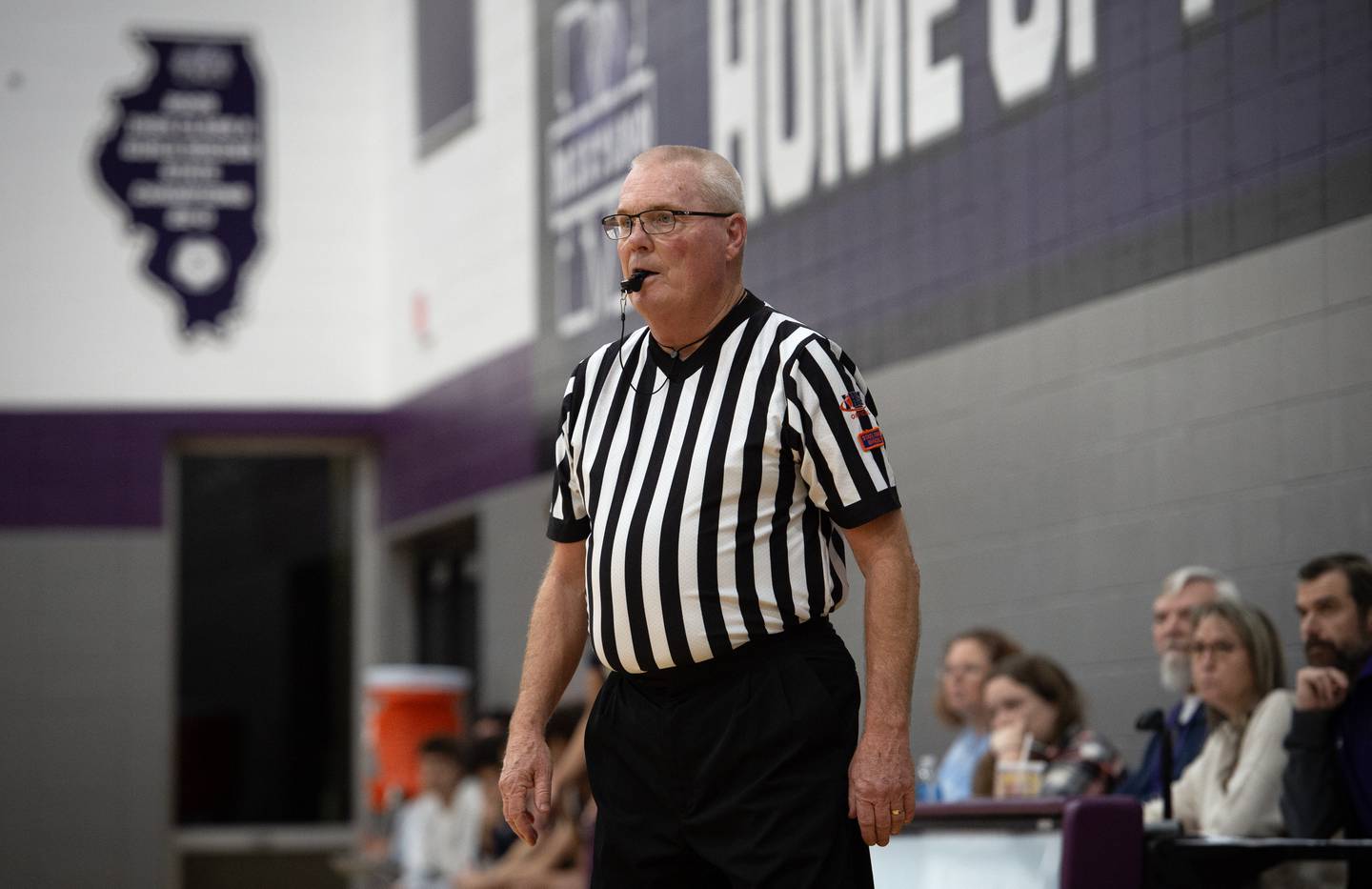 Tom Hahs officiates a game between Peotone and IC Catholic in the Thanksgiving tournament at Manteno High School on Monday, November 24, 2025.