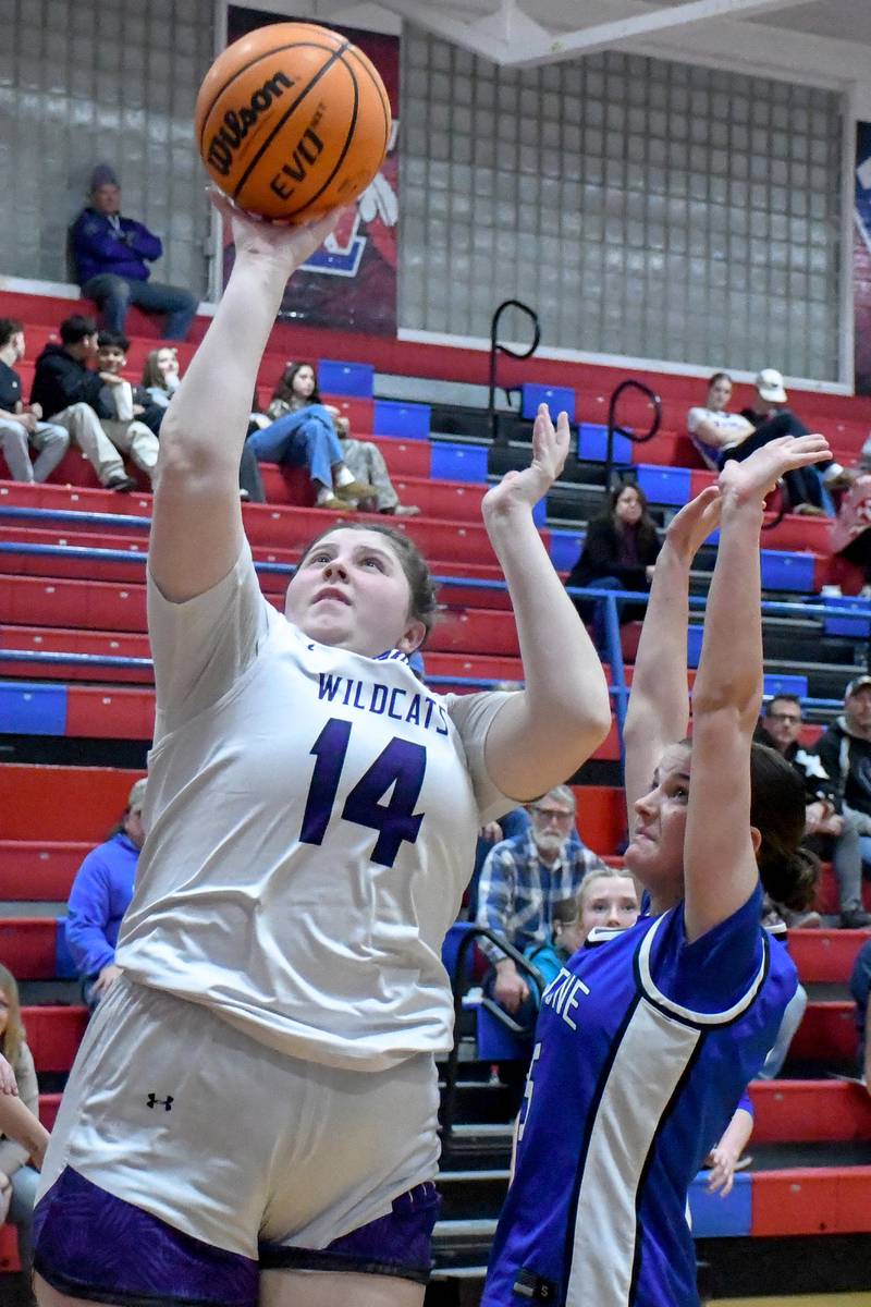 Wilmington's Melia Hincherick elevates for a layup during Peotone's 35-32 victory over Wilmington in the Iroquois West Holiday Tournament on Wednesday, December 17, 2025.