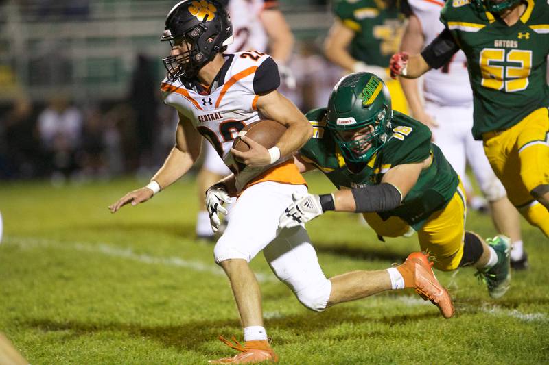 Crystal Lake Central's Vince Honer is tackled by Crystal Lake South's Nate Compere on Friday Sept.30,2022 in Crystal Lake.