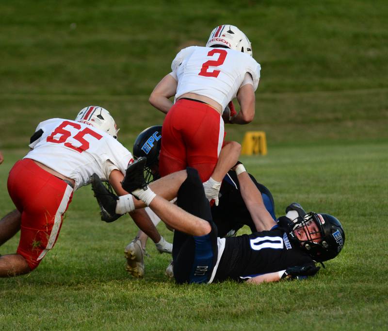 Oregon's Cooper Johnson tries to jump over Eastland-Pearl City's Brody Simons (0) during a practice game on Friday, Aug. 22, 2025 at Lanark. The Hawks open the 2025 season at Genoa-Kingston on Friday, Aug. 29 while EPC hosts Fulton.