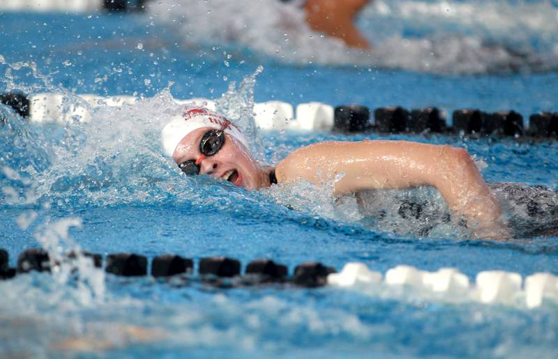 Marian Central’s Abby Hill competes in the 500-yard freestyle championship heat during the IHSA Girls State Swimming and Diving Championships at the FMC Natatorium in Westmont on Saturday, Nov. 11, 2023.