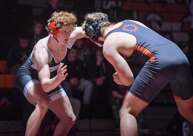 Marian Central's Dan French and St. Charles East's Cooper Murray wrestle at 190 pounds during a match in St. Charles on Wednesday, December 20, 2023.