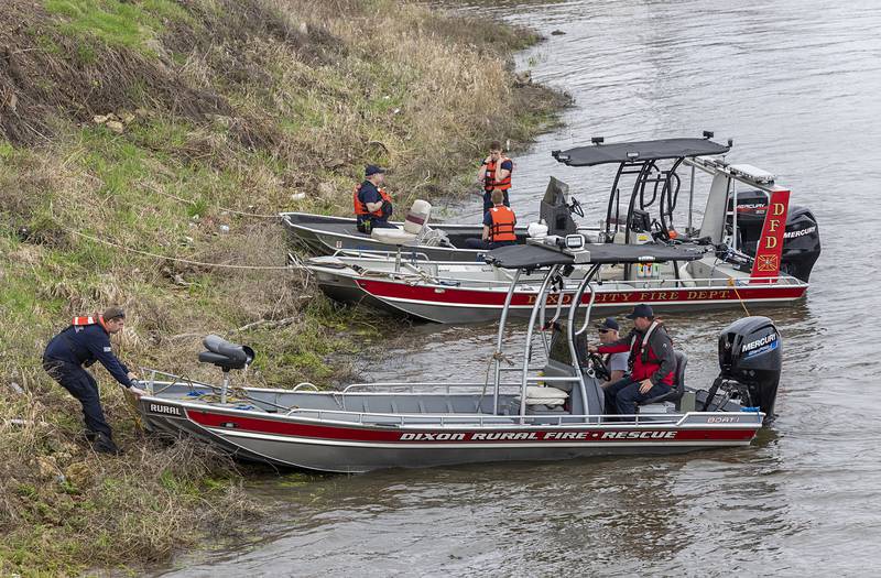 Rescue boats from local departments work the scene in Dixon Tuesday, April 14, 2026, after an individual jumped over the railing off of the Peoria Avenue Bridge late Monday night.